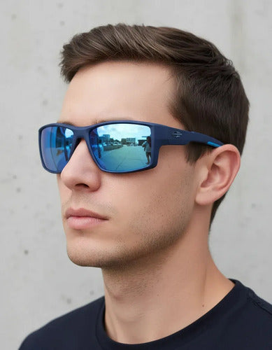 Óculos De Sol Mormaii Solar Joaca 4 Azul Fosco Com Detalhes Azuis Lente Espelhada Azul Curvado